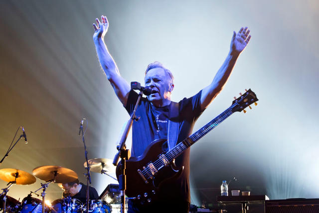 BERLIN, GERMANY - OCTOBER 07: Singer and guitarist Bernard Sumner of the British band New Order performs live on stage during a concert at the Tempodrom on October 7, 2019 in Berlin, Germany. (Photo by Frank Hoensch/Redferns)